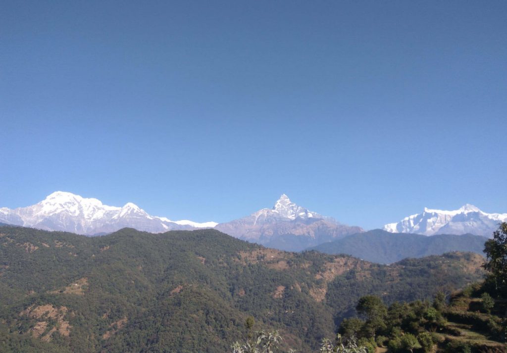 far view of fishtail mountain and annapurna range